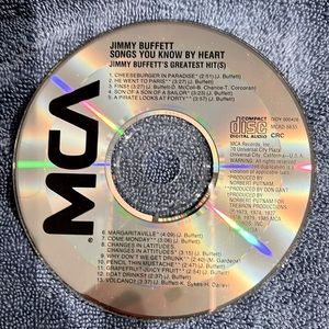 CD. Jimmy Buffett. Songs you know by heart. Jimmy Buffett’s greatest hits.